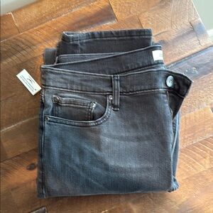 Slim Black Jeans with Subtle Distressing
